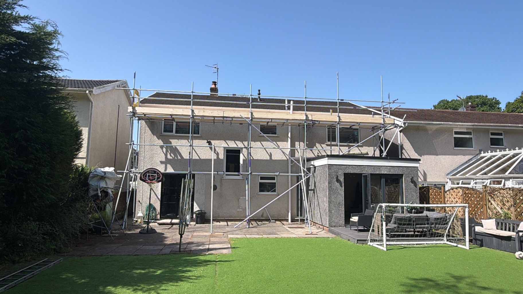 Rear elevation scaffolding with extension access in Swansea by All Heights Wales Ltd.