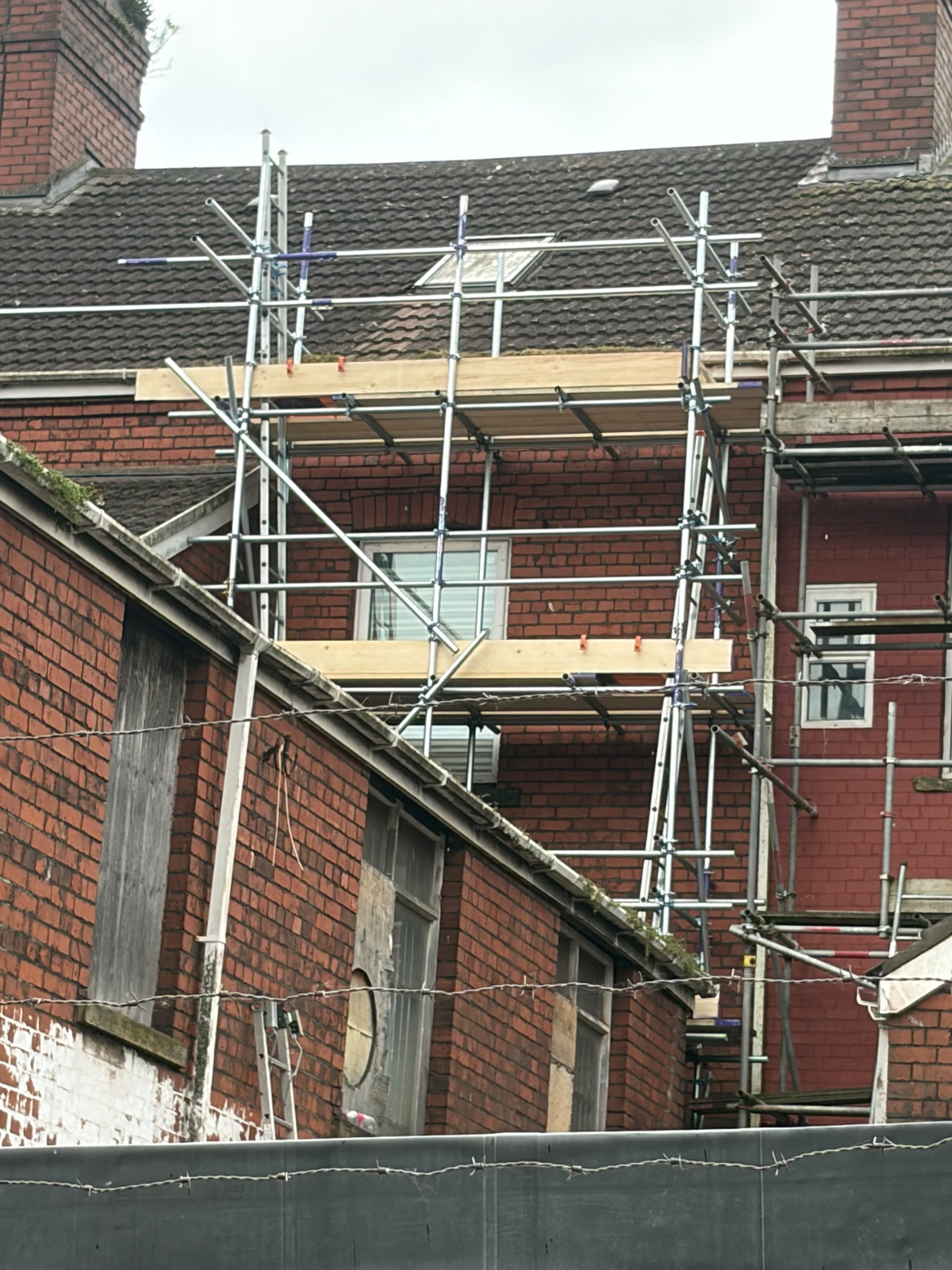 Tight access rear scaffold for skylight and roof repair by All Heights Wales Ltd.