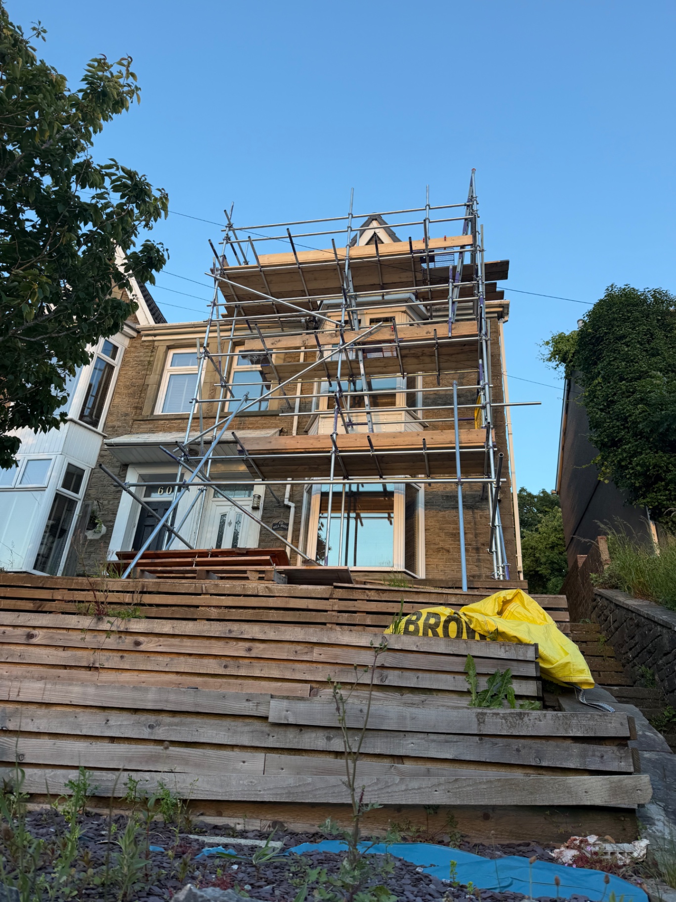Three-storey access scaffolding on a Victorian property in Swansea by All Heights Wales Ltd.