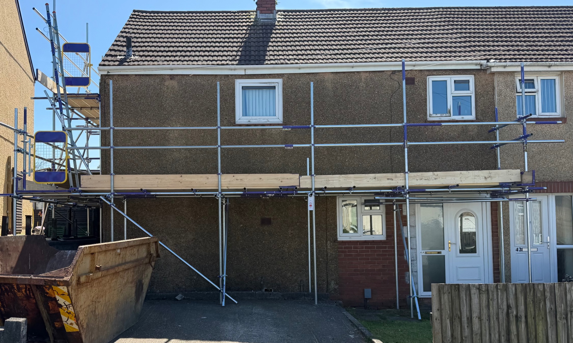 Single lift driveway scaffold for upper window and roofline work in Swansea by All Heights Wales Ltd.