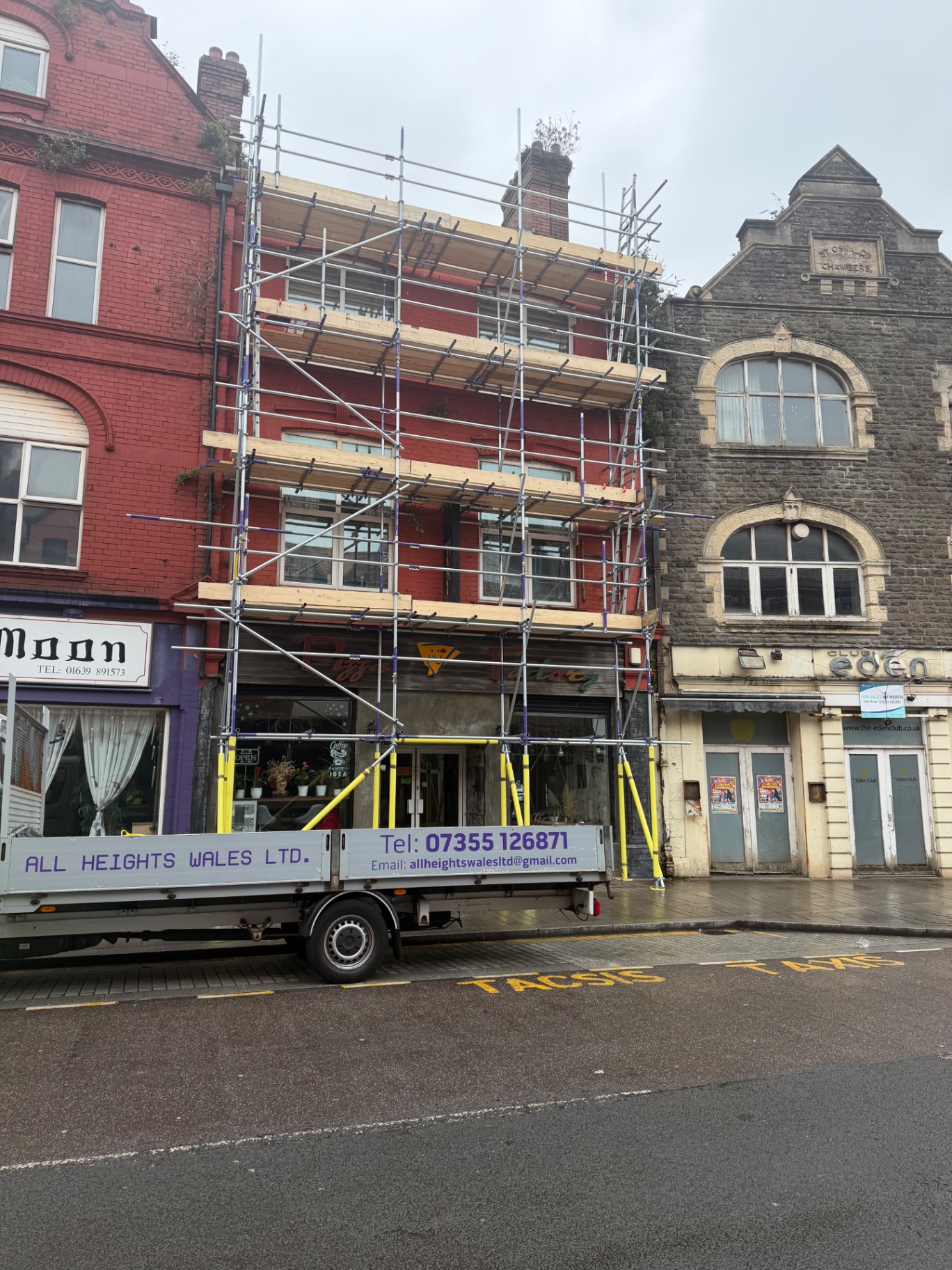 Four-lift commercial shopfront scaffolding on Swansea high street by All Heights Wales Ltd.
